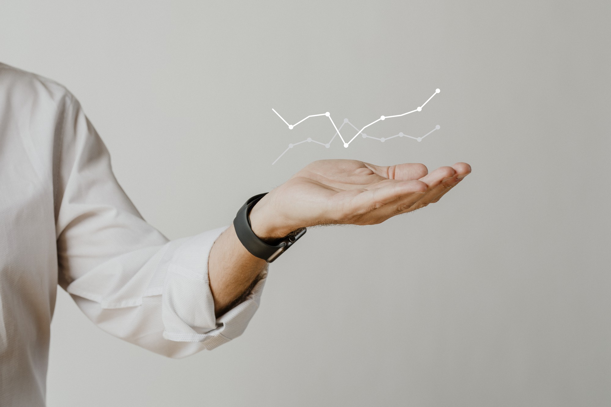 digital-graph-with-businessman-hand-overlay Imagem de rawpixel.com no Freepik